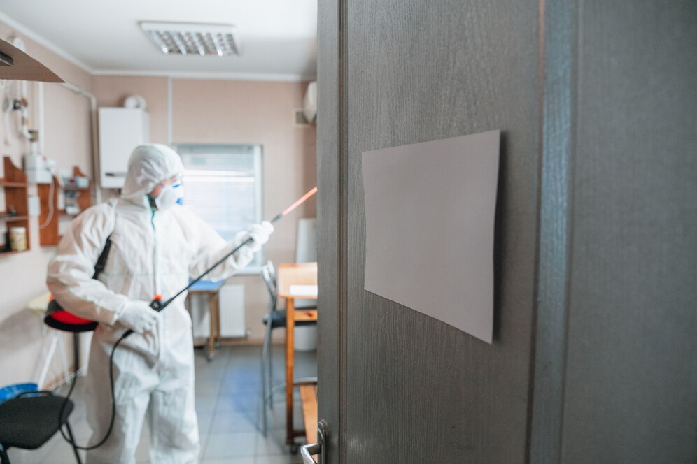 coronavirus-pandemic-disinfector-protective-suit-mask-sprays-disinfectants-house-office_155003-7311